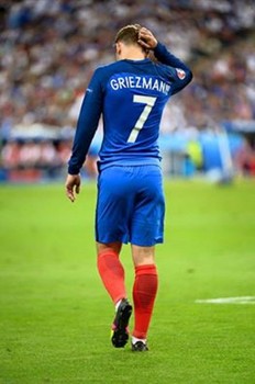 غريزمان: الحزن كبير وسنعود أقوى